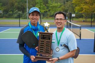 2024 Commissioners' Cup Tournament Winners with Trophy